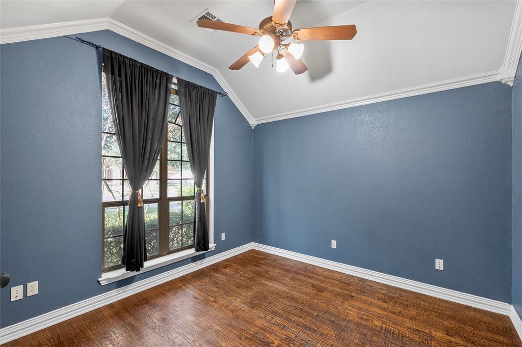 302 Canterbury Road Waco, TX 76712 - Photo 5 of 29 an empty room with windows and entrance