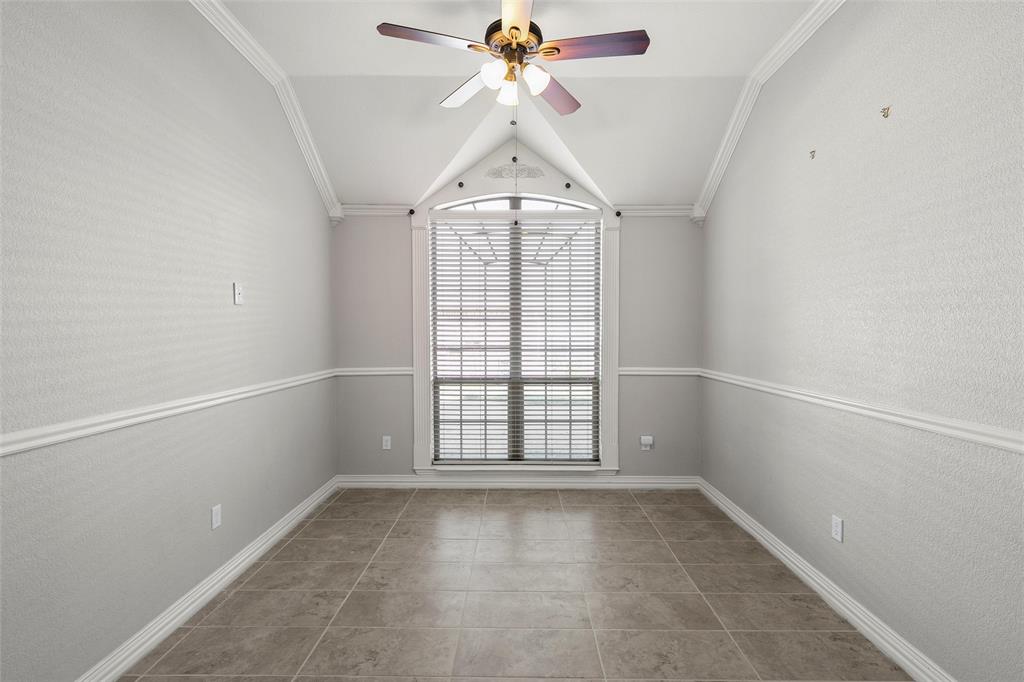 302 Canterbury Road Waco, TX 76712 - Photo 6 of 29 an empty room with windows and ceiling fan