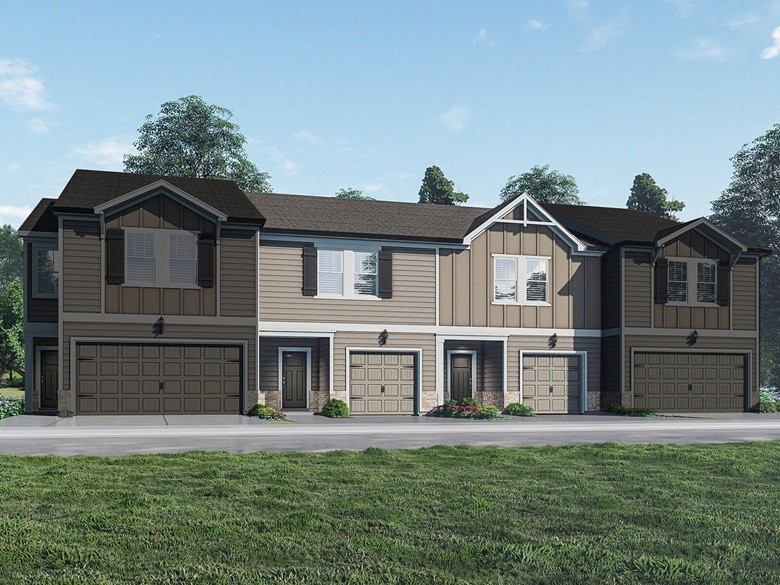 a view of a yard in front of a house