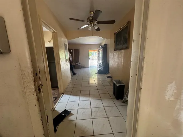 a view of a hallway with a couch