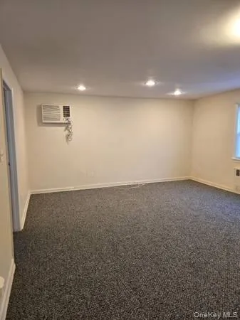 an empty room with a natural light