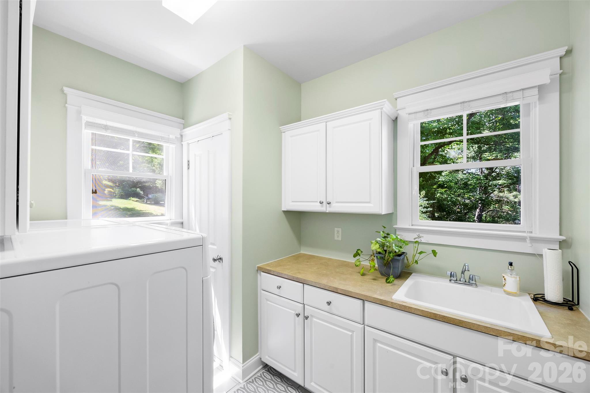 606 Andover Lane Tega Cay, SC 29708 - Photo 19 of 48 a bathroom with a sink and a window