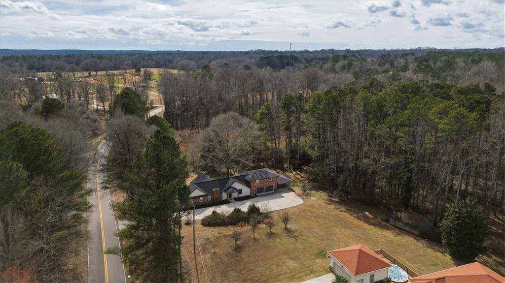 4911 Lower Jersey Road Oxford, GA 30054 - Photo 43 of 56 a view of a lake in middle of the town