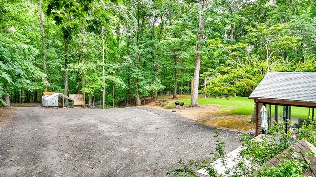 a view of backyard with green space