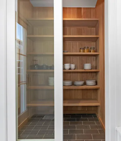 a bathroom with a glass shower door