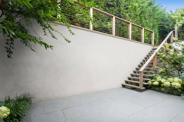 a view of balcony with furniture