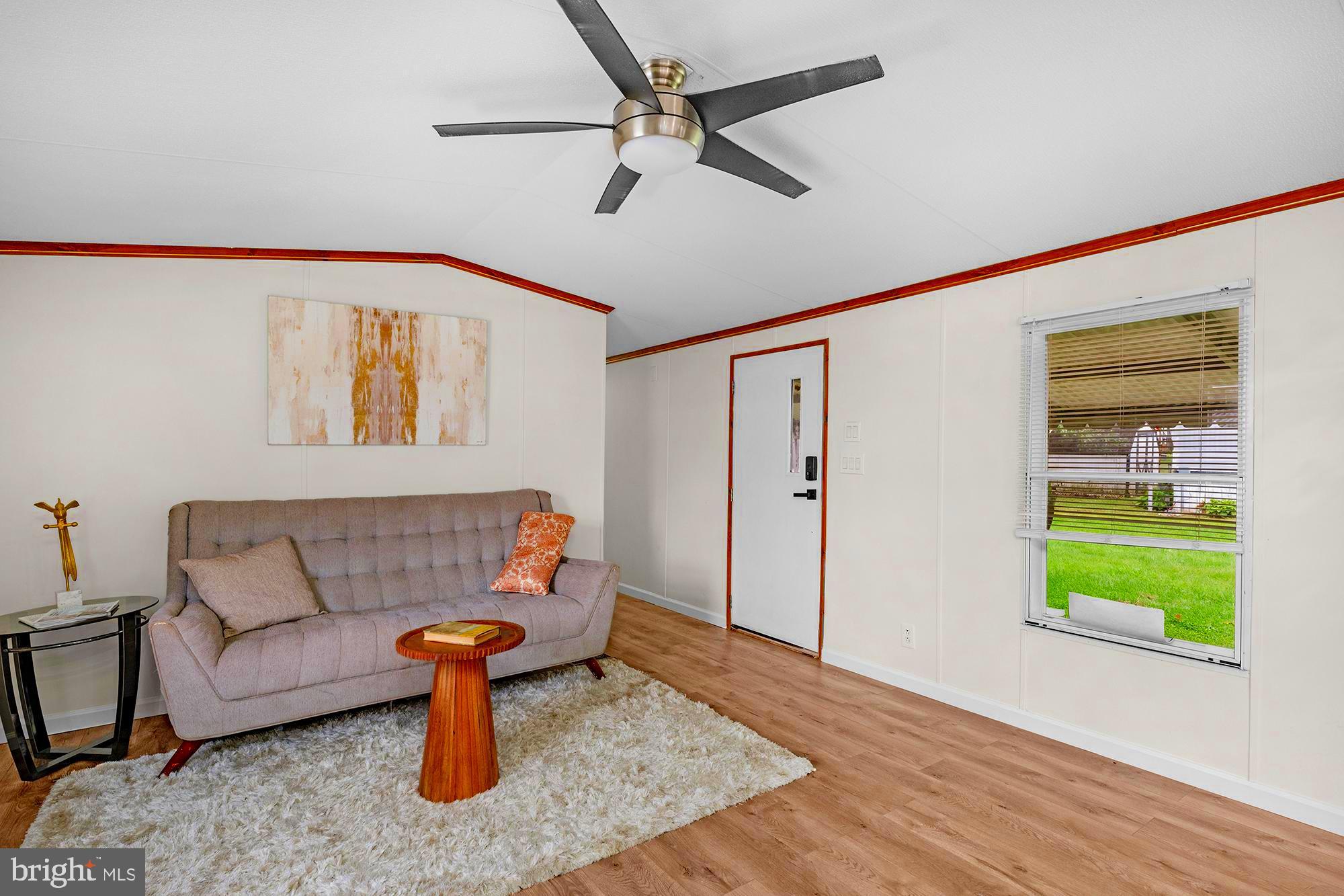 11540 Philadelphia Road, Unit 5A White Marsh, MD 21162 - Photo 9 of 23 a living room with furniture and a window