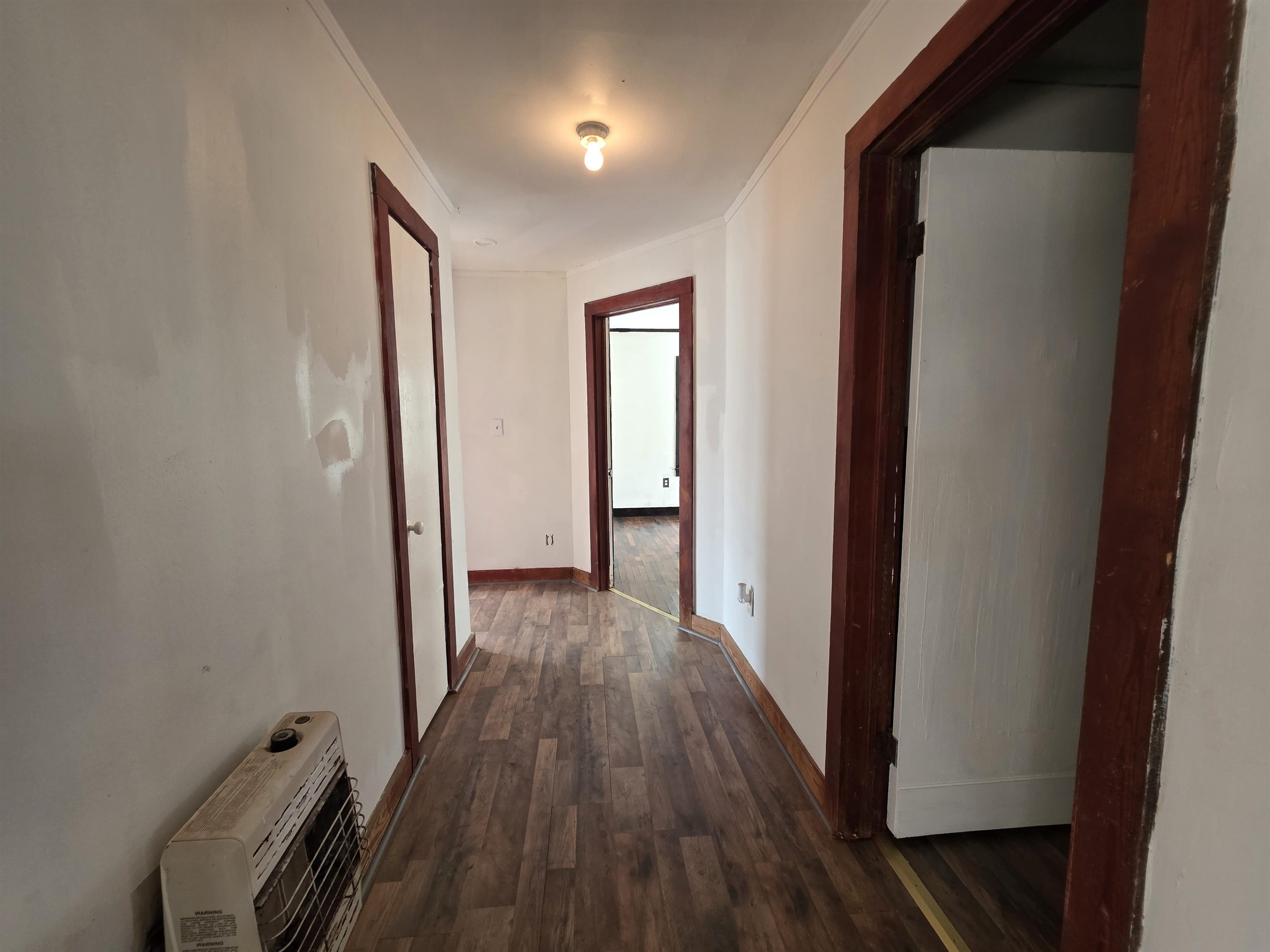 95 Sugar Maple Avenue Savannah, TN 38372 - Photo 7 of 11 a view of a hallway with wooden floor