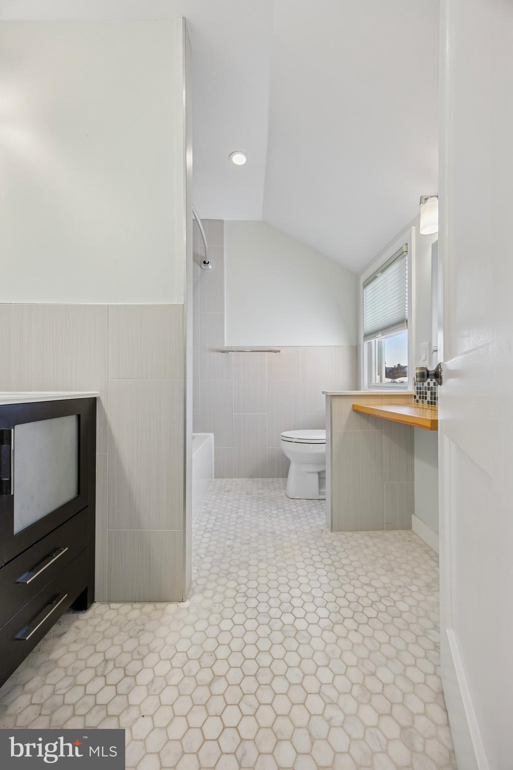 344 Inwood Road Ardmore, PA 19003 - Photo 13 of 16 a bathroom with a sink a toilet and a mirror