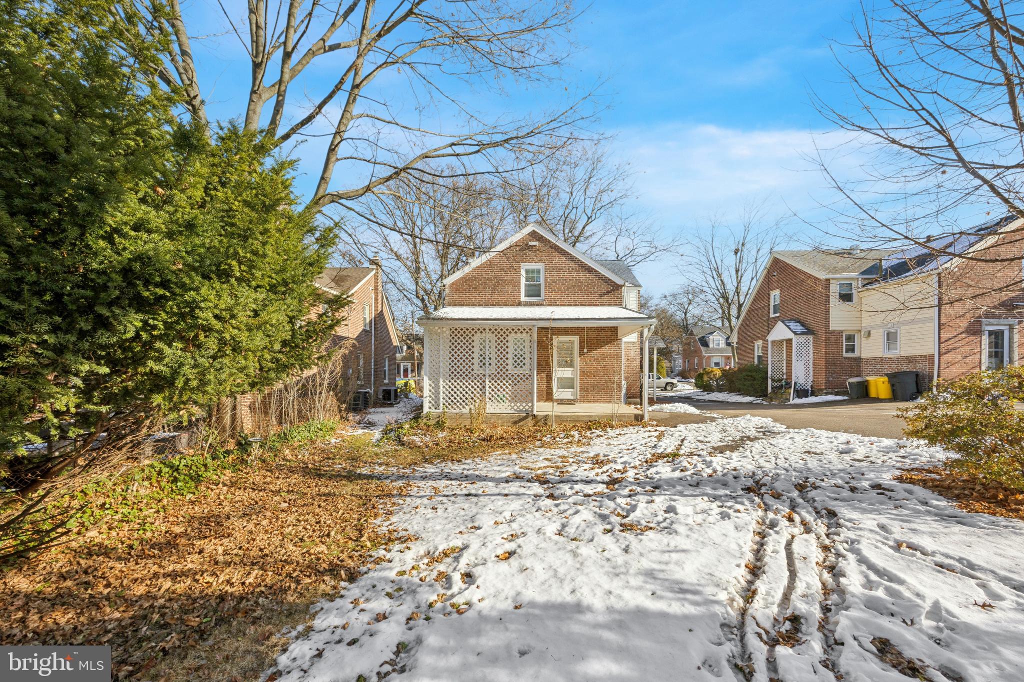 344 Inwood Road Ardmore, PA 19003 - Photo 16 of 16 a front view of a house with a yard