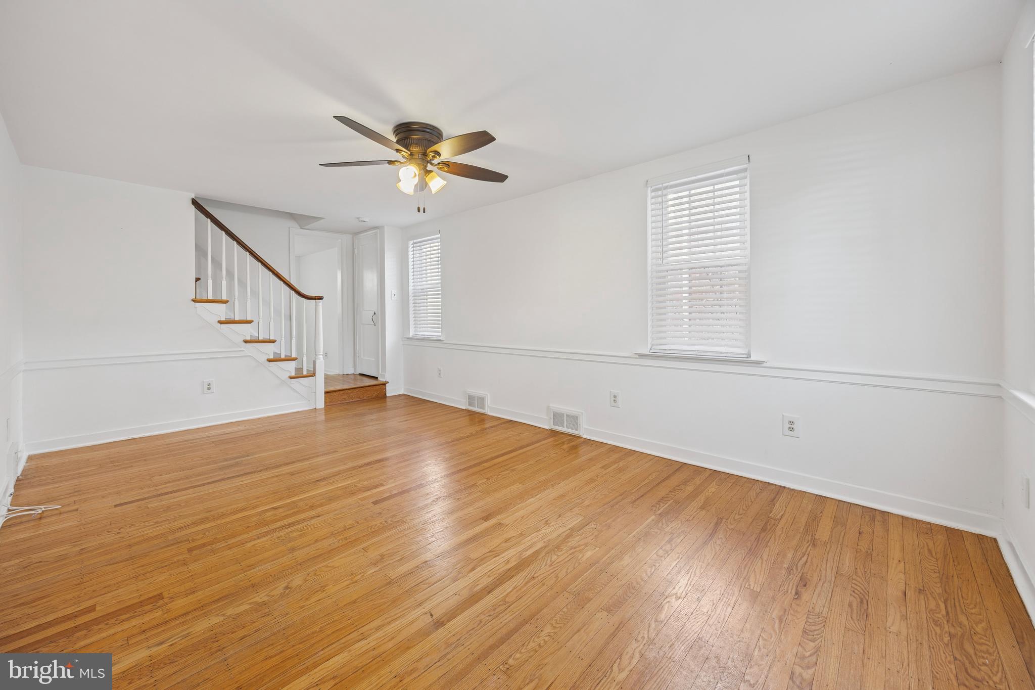 344 Inwood Road Ardmore, PA 19003 - Photo 4 of 16 a view of empty room with wooden floor and fan