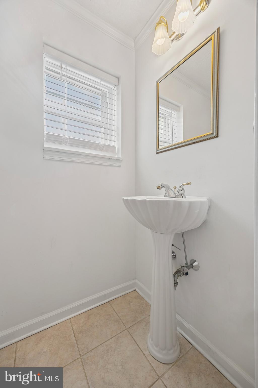 344 Inwood Road Ardmore, PA 19003 - Photo 9 of 16 a bathroom with a sink a mirror and a vanity