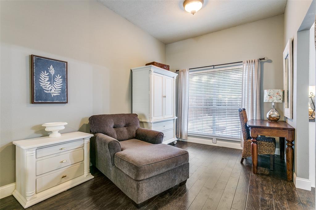 2133 Rim Rock Drive Keller, TX 76248 - Photo 10 of 37 Sitting room featuring dark wood-style floors and baseboards