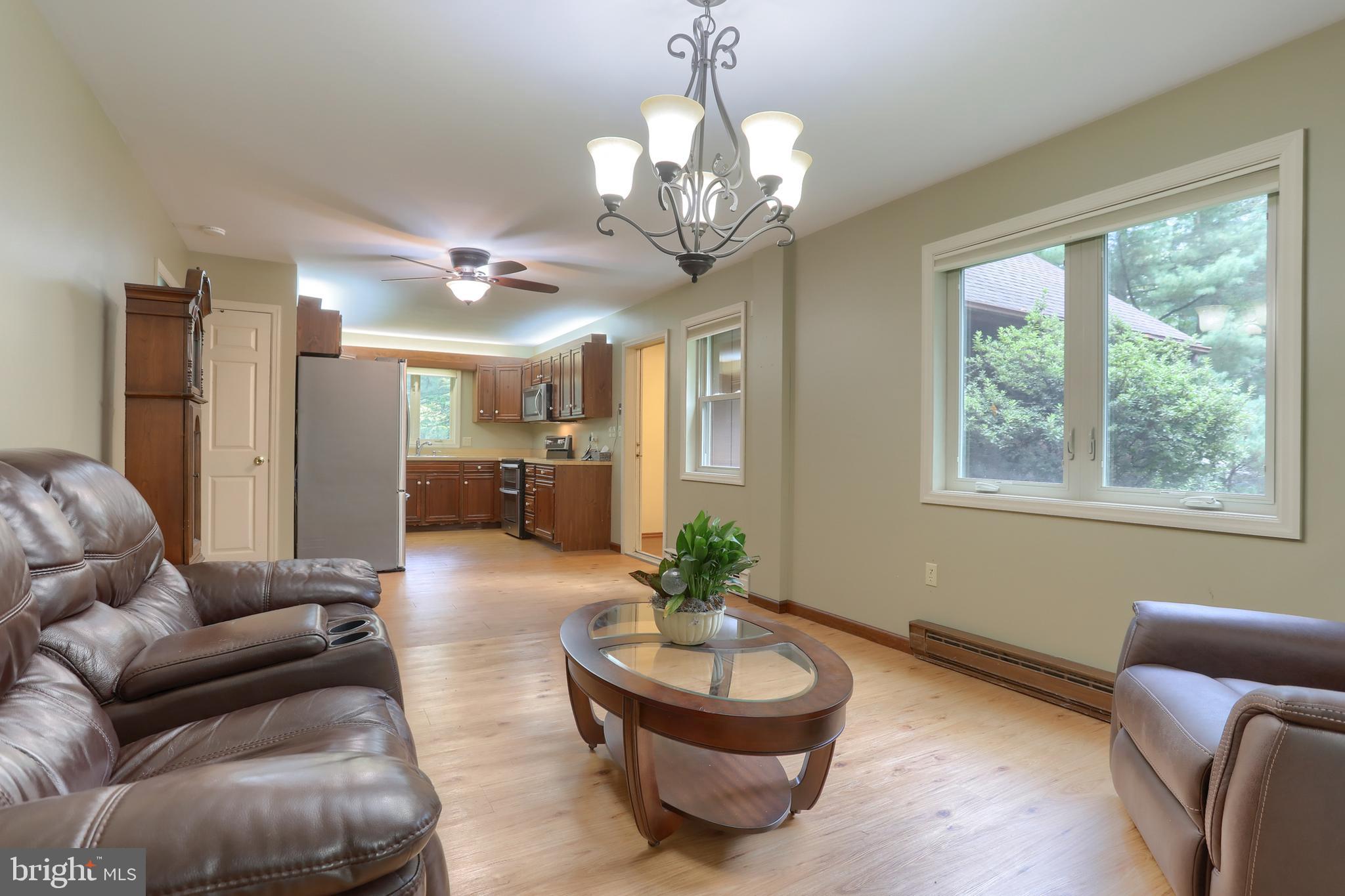903 Tulip Tree Drive Lebanon, PA 17042 - Photo 16 of 54 a living room with furniture and a large window