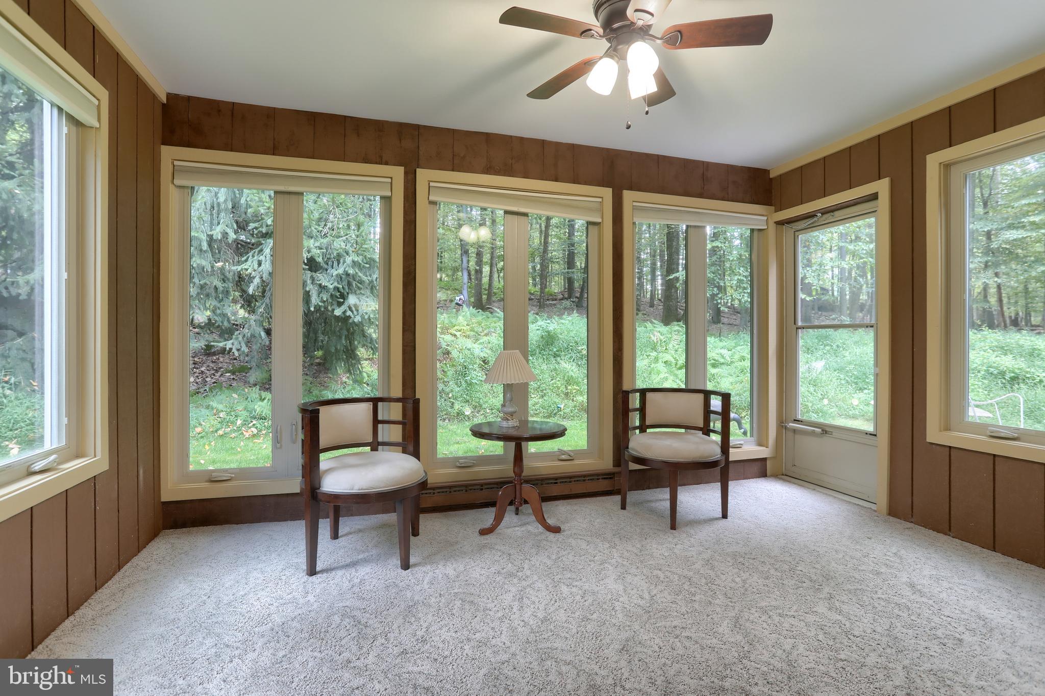 903 Tulip Tree Drive Lebanon, PA 17042 - Photo 17 of 54 a living room with furniture and a window with garden view