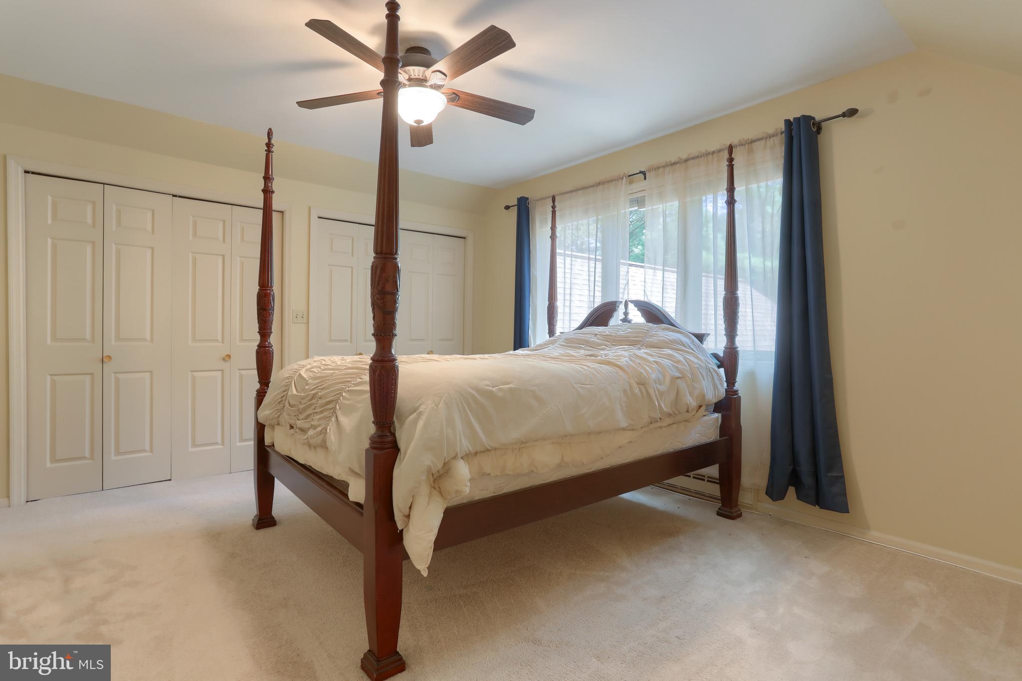 903 Tulip Tree Drive Lebanon, PA 17042 - Photo 31 of 54 a bed sitting in a bedroom next to a window