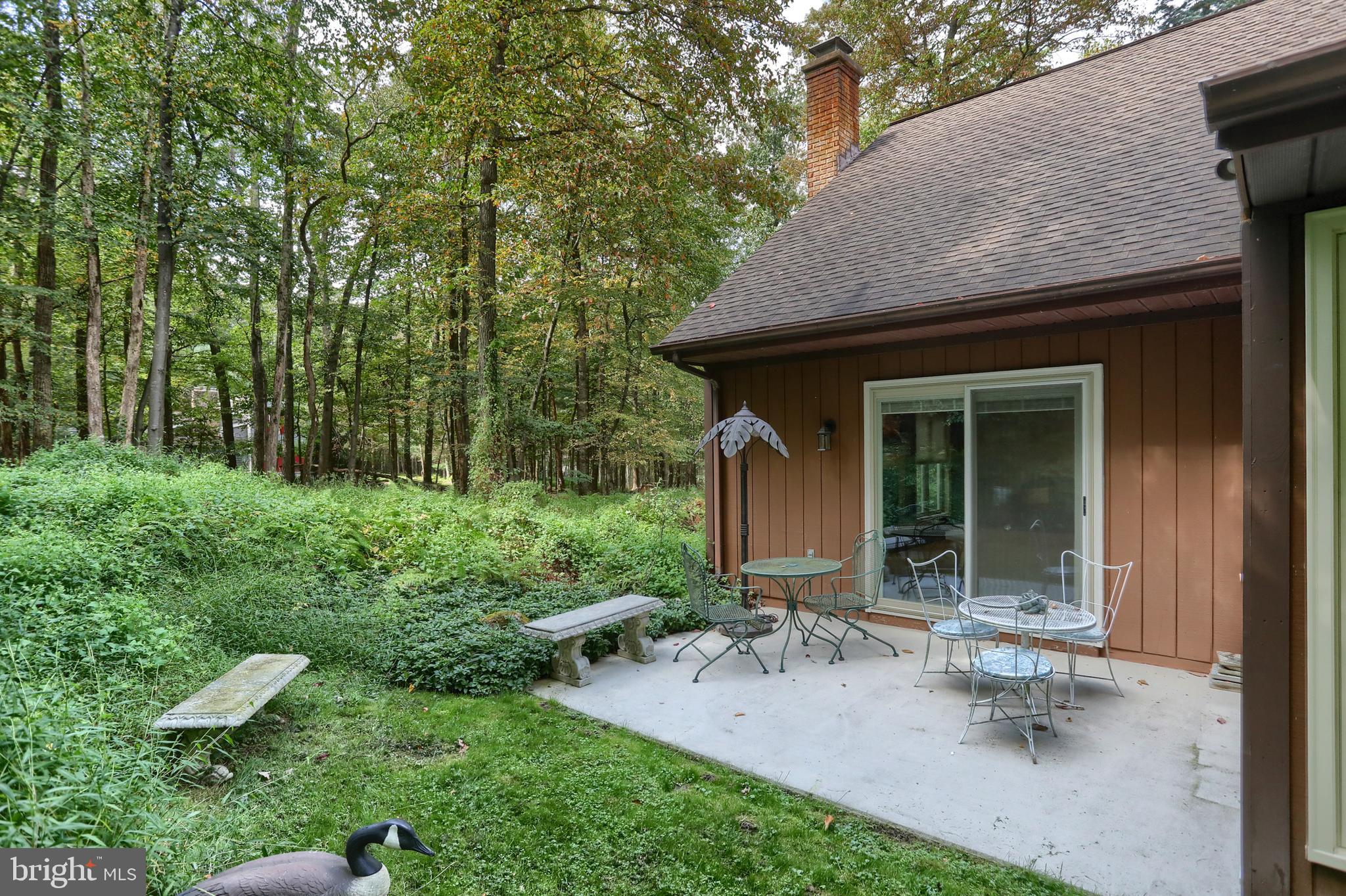 903 Tulip Tree Drive Lebanon, PA 17042 - Photo 34 of 54 a view of a backyard with sitting area and garden