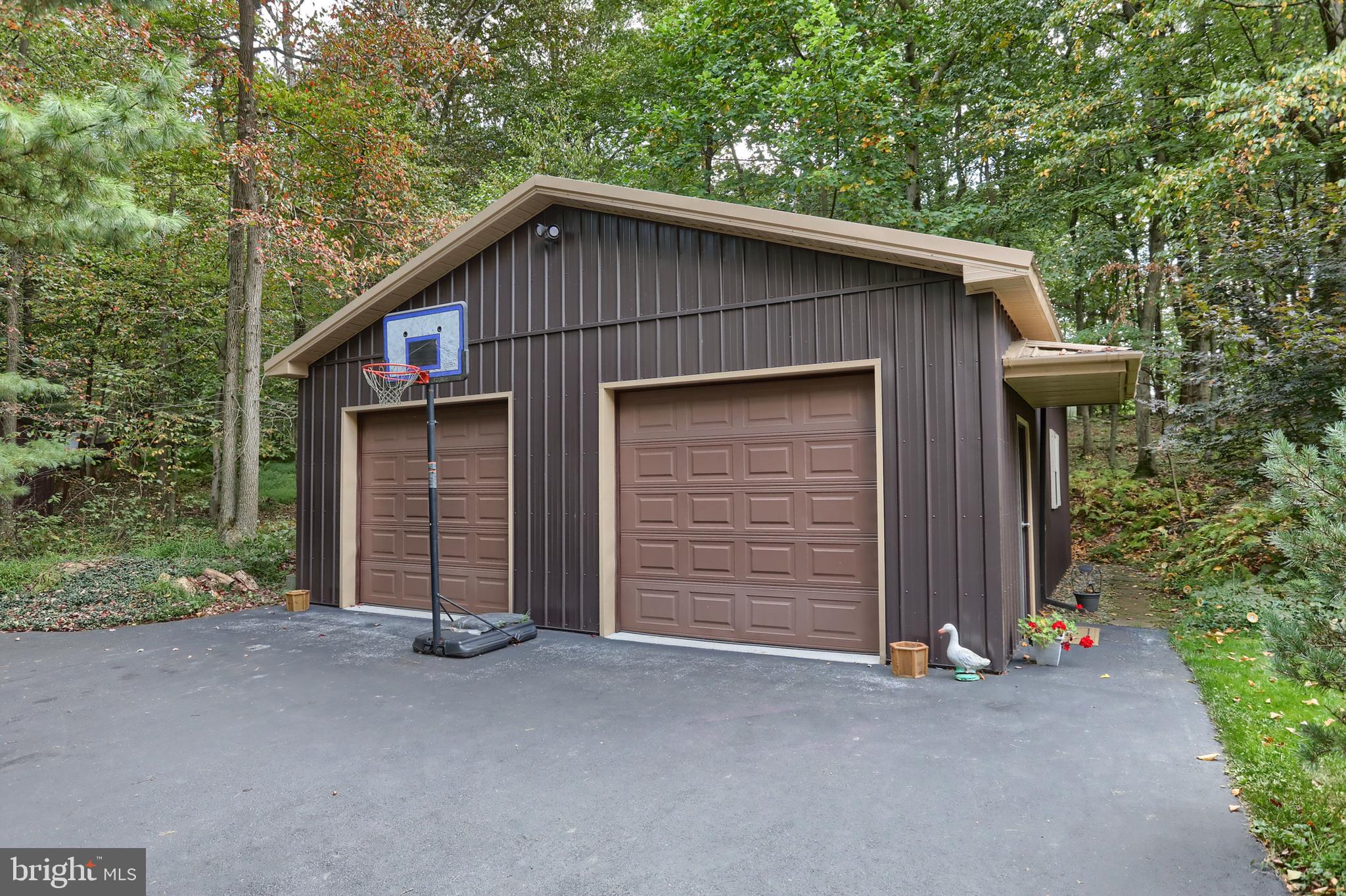 903 Tulip Tree Drive Lebanon, PA 17042 - Photo 39 of 54 a front view of a house with a garden