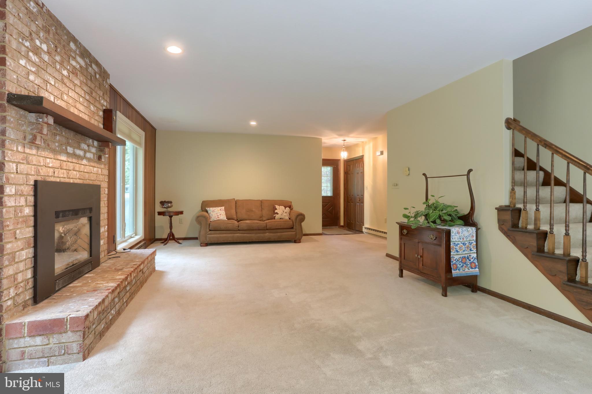 903 Tulip Tree Drive Lebanon, PA 17042 - Photo 10 of 54 a living room with furniture and a fireplace