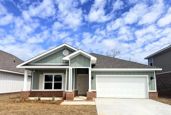 a front view of a house with a garage