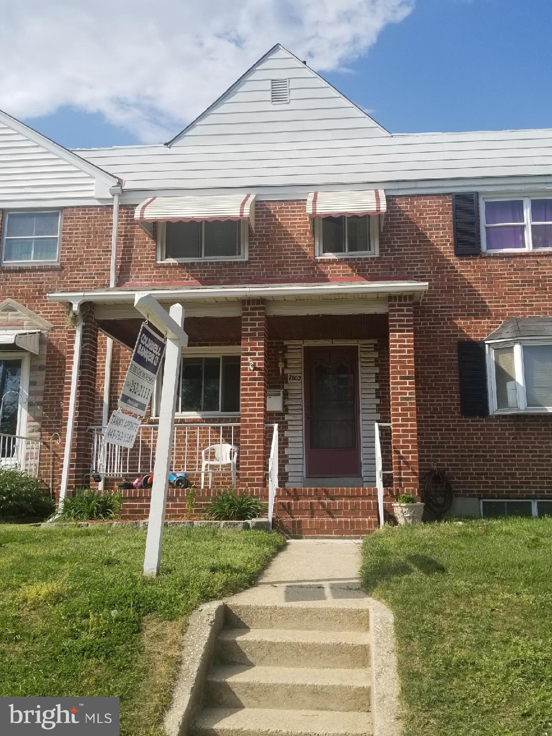 7802 Kavanagh Road Baltimore, MD 21222 - Photo 1 of 9 a front view of a house with a yard