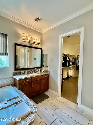 a room with furniture pool table and flat screen tv