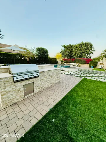 a view of a backyard with plants