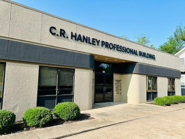 Tbd West Main Street Denison, TX 75020 - Photo 5 of 8 a front view of a building