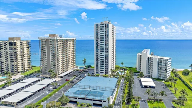 a view of a city with tall buildings