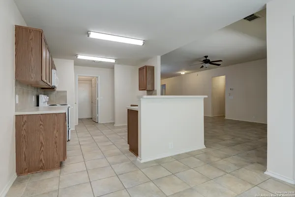 a view of a kitchen with a sink