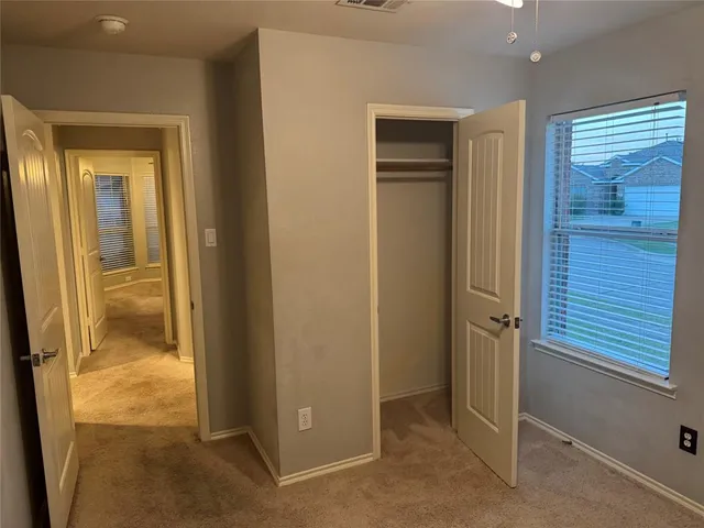 a kitchen with granite countertop a sink and a stove top oven