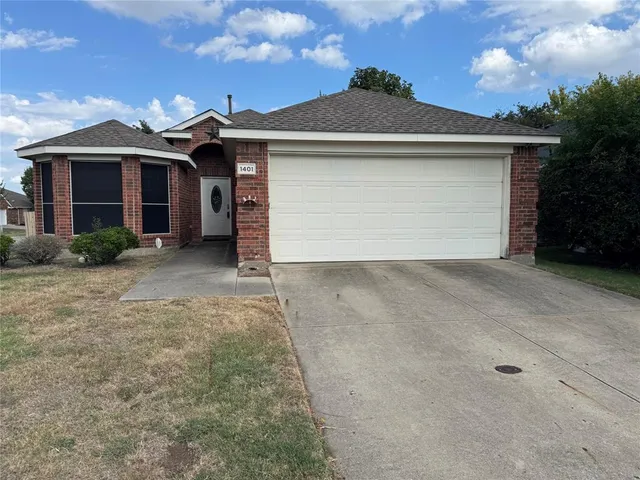 a kitchen with stainless steel appliances granite countertop a sink and a stove