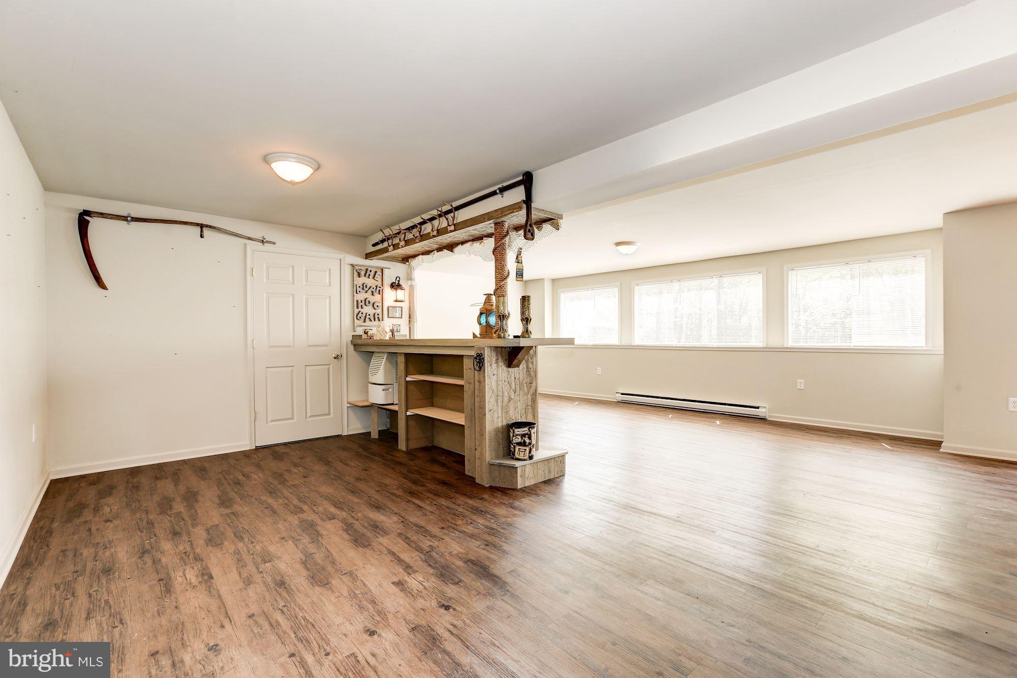 12019 Cove Road Clear Spring, MD 21722 - Photo 22 of 30 Rec room w/ bar in basement