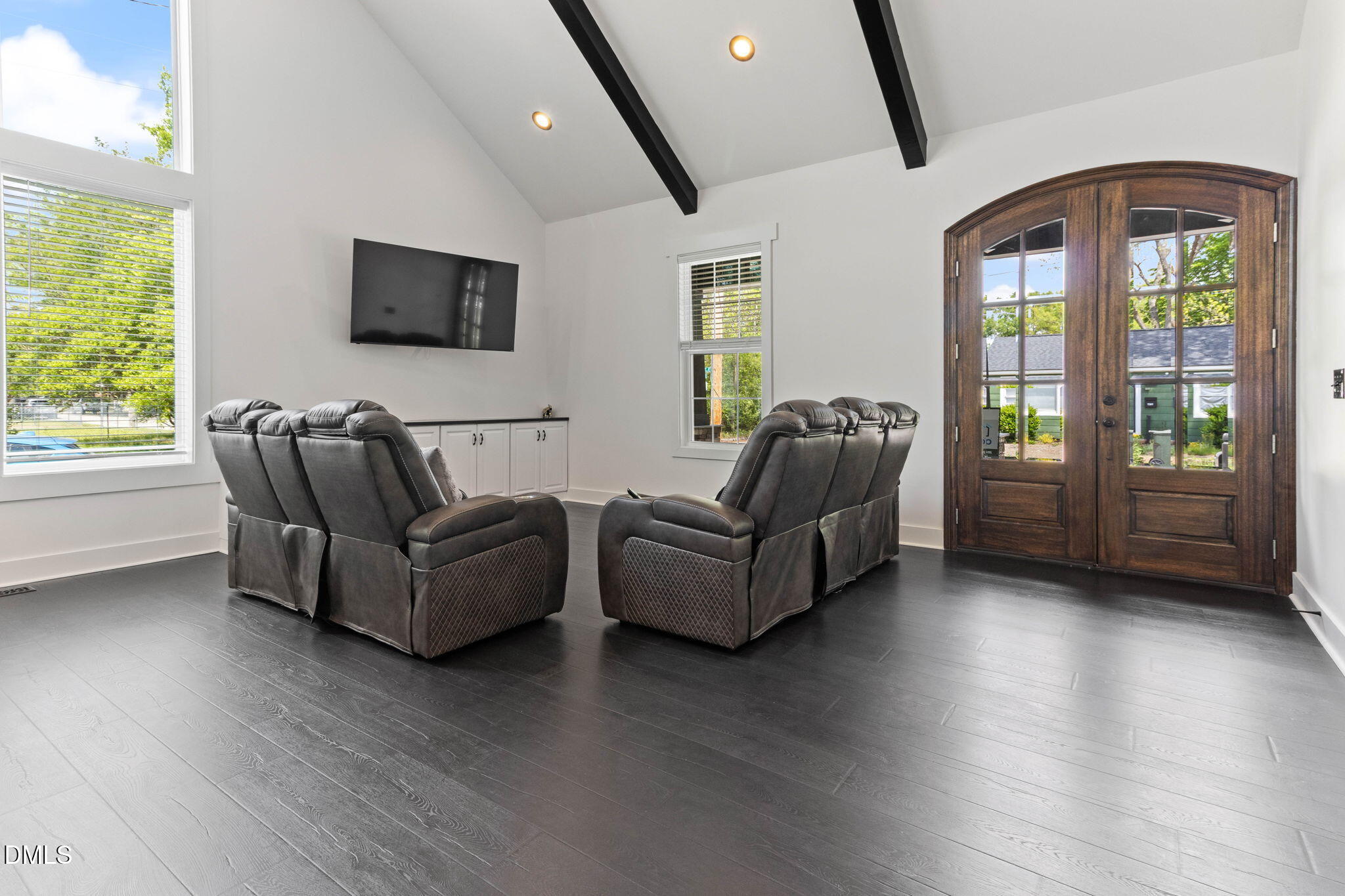 1300 Atlantic Street East Wilson, NC 27893 - Photo 11 of 28 a living room with furniture and a flat screen tv