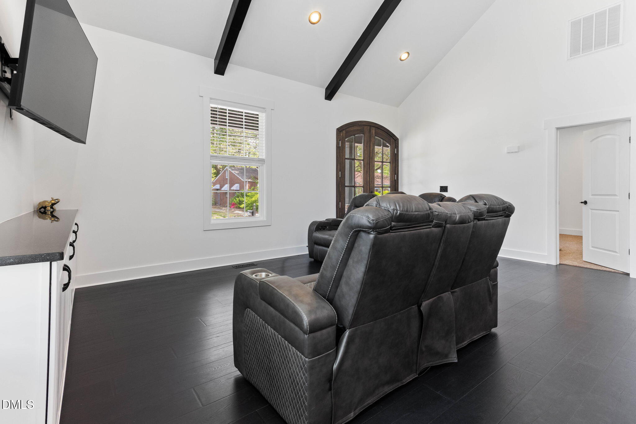1300 Atlantic Street East Wilson, NC 27893 - Photo 12 of 28 a living room with furniture and a flat screen tv