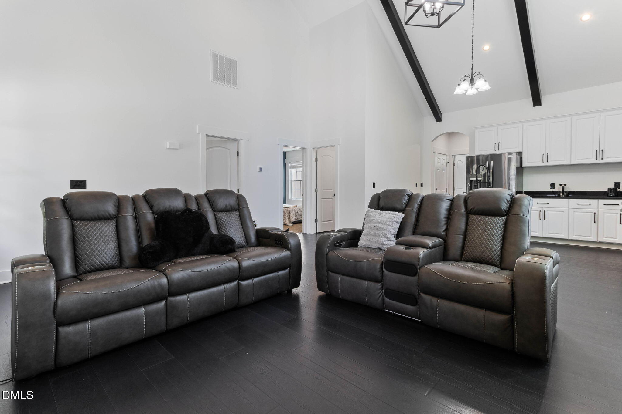 1300 Atlantic Street East Wilson, NC 27893 - Photo 13 of 28 a living room with furniture a couch and a ceiling fan