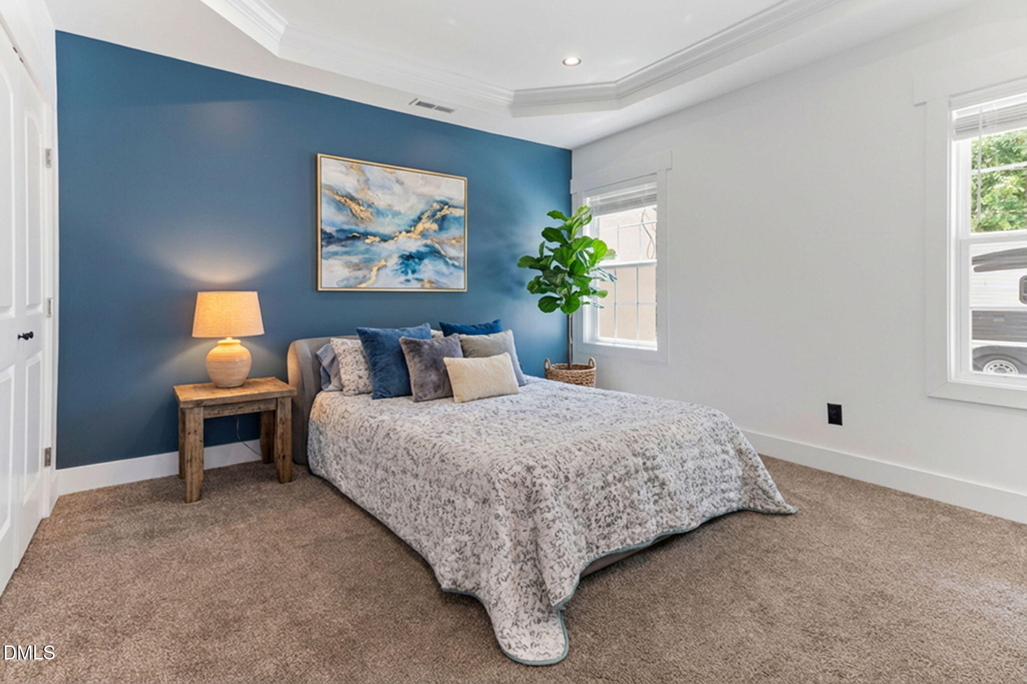 1300 Atlantic Street East Wilson, NC 27893 - Photo 17 of 28 a spacious bedroom with a bed and a window