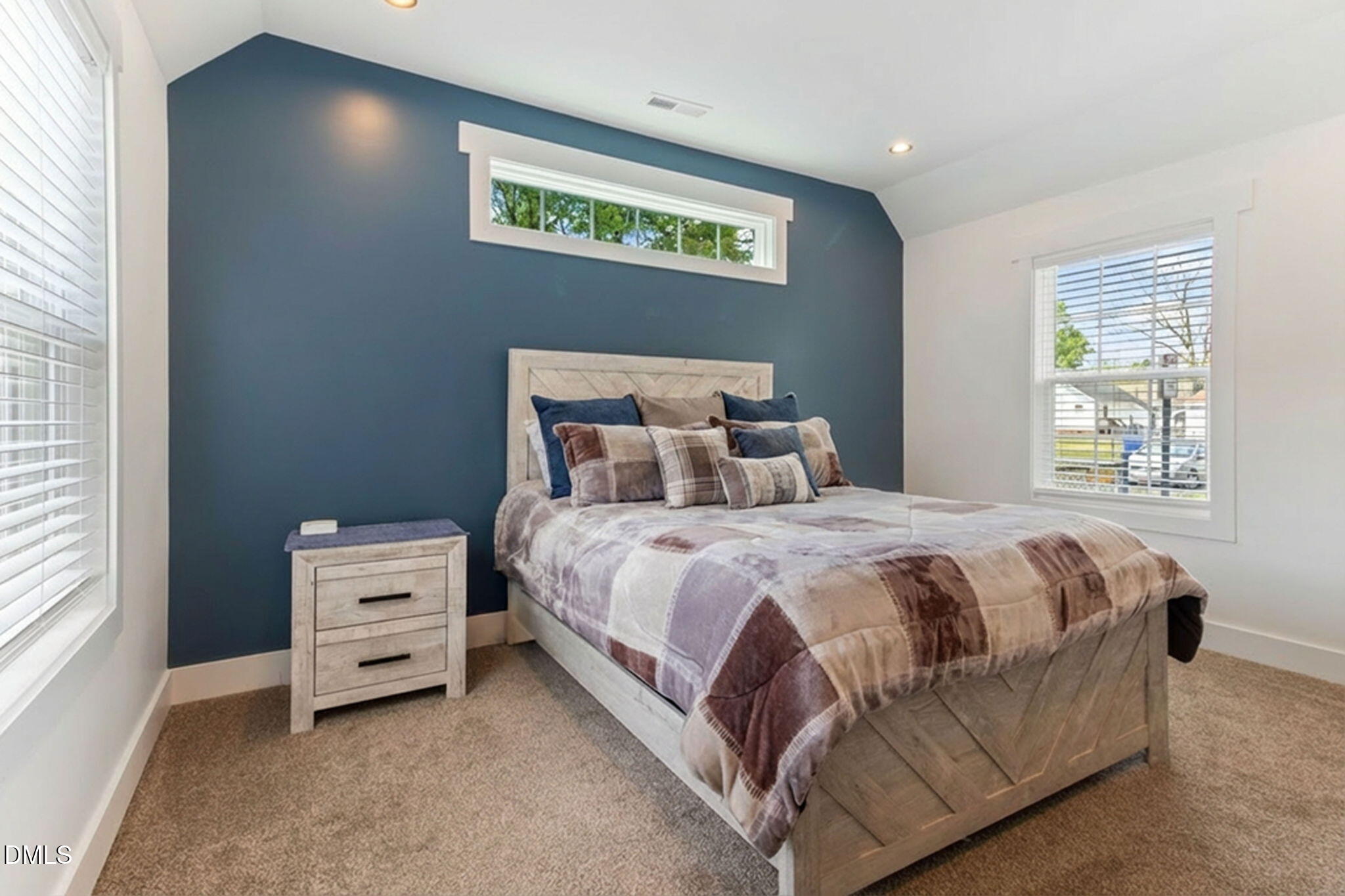 1300 Atlantic Street East Wilson, NC 27893 - Photo 23 of 28 a bedroom with a bed and a window