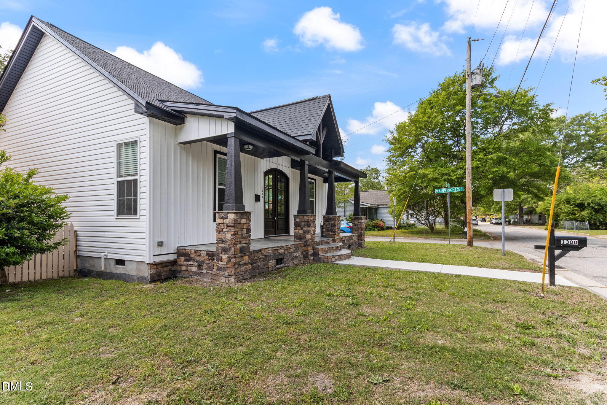 1300 Atlantic Street East Wilson, NC 27893 - Photo 2 of 28 a view of a house with backyard and sitting area
