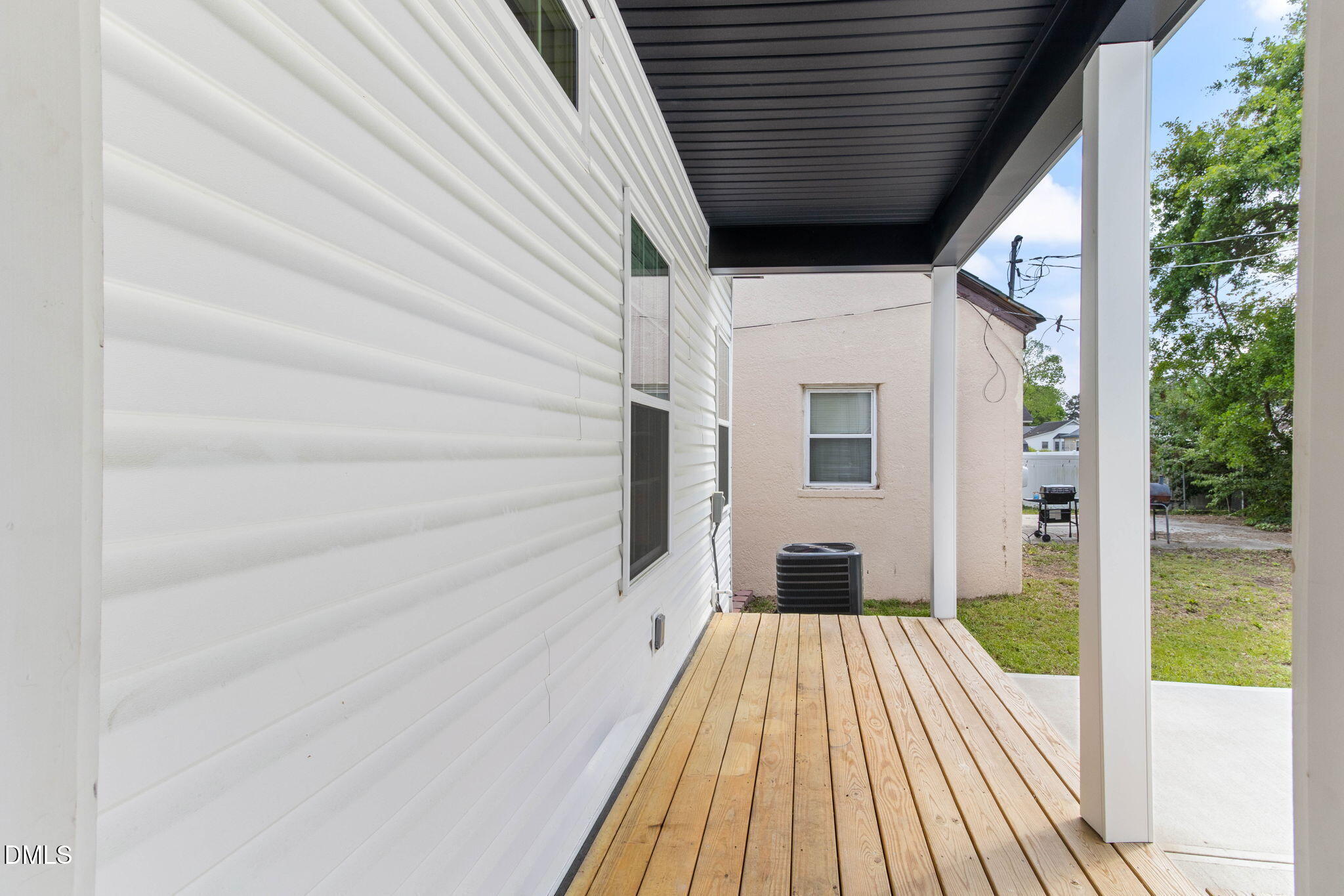 1300 Atlantic Street East Wilson, NC 27893 - Photo 6 of 28 a view of a balcony with wooden floor