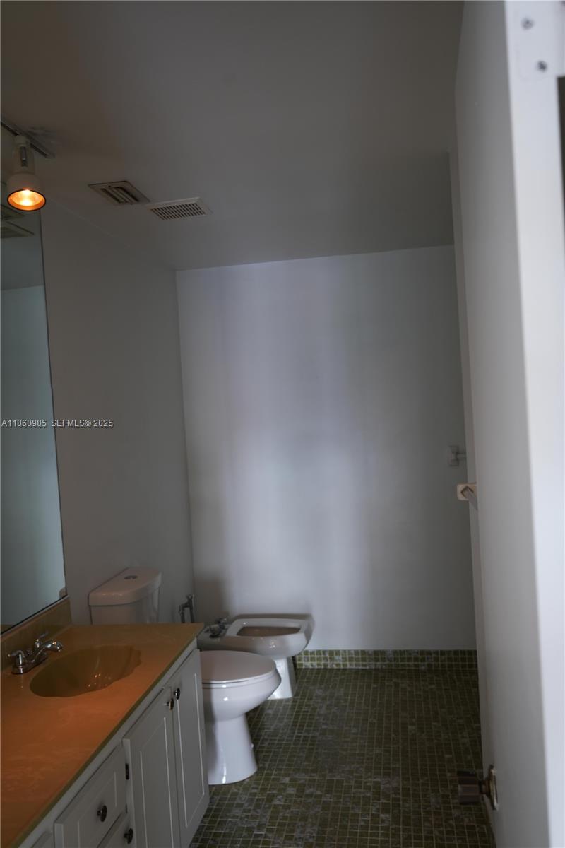2800 South University Drive, Unit 2A Davie, FL 33328 - Photo 16 of 23 a bathroom with a sink and toilet