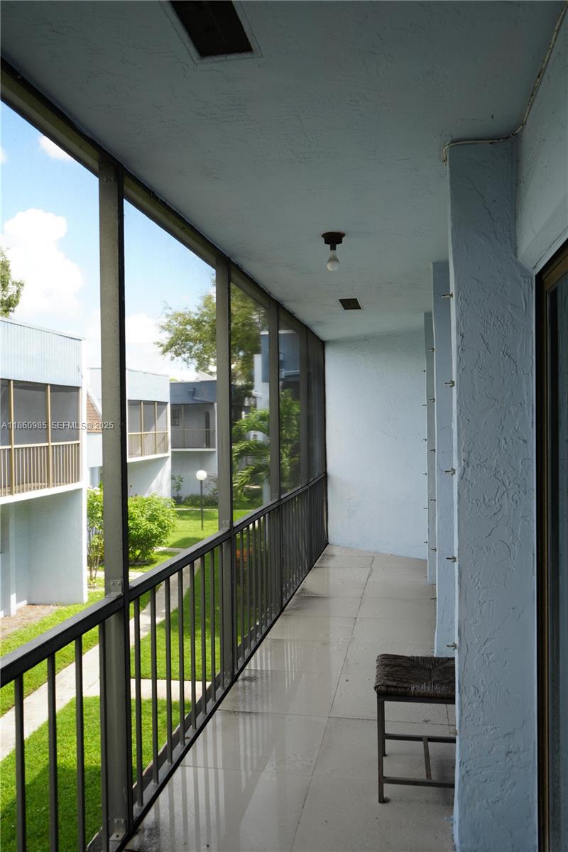 2800 South University Drive, Unit 2A Davie, FL 33328 - Photo 20 of 23 a view of a balcony with chairs