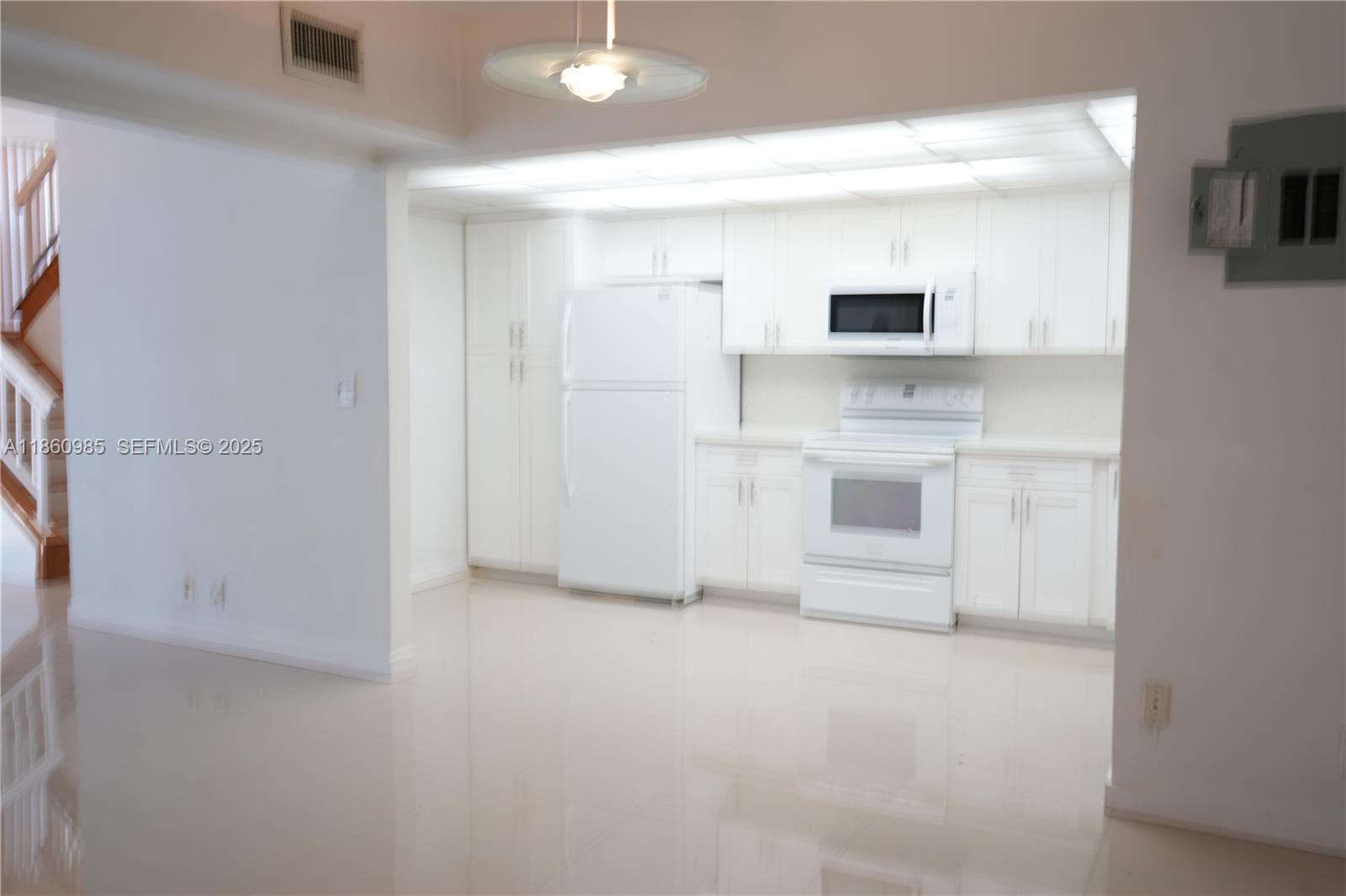 2800 South University Drive, Unit 2A Davie, FL 33328 - Photo 9 of 23 a view of a kitchen with a sink