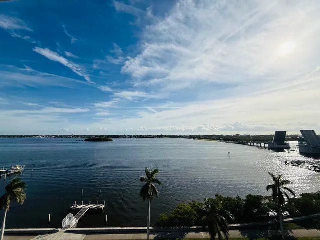a view of a balcony with chairs