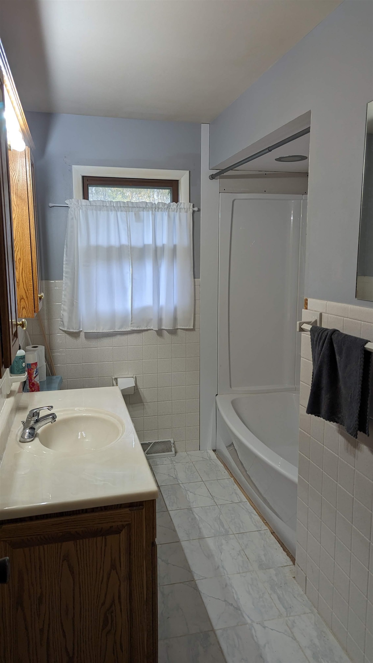 8539 North Pecatonica Road Pecatonica, IL 61063 - Photo 18 of 23 a bathroom with a sink and a bathtub