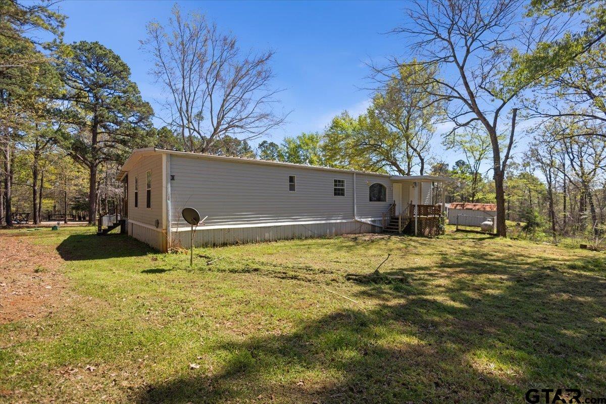 18607-c R 498 C R 498 Lindale, TX 75771 - Photo 41 of 41 a view of a house with a yard