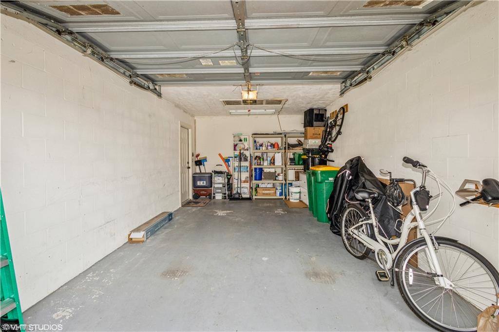 2608 Sailors Way, Unit 122 Naples, FL 34109 - Photo 44 of 47 a view of a room with gym equipment