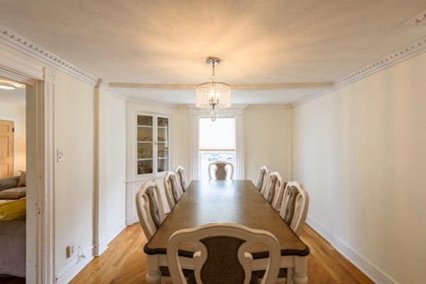 55 Samoset Avenue, Unit 1 Oak Bluffs, MA 02557 - Photo 2 of 10 a view of a dining room with furniture window and outside view