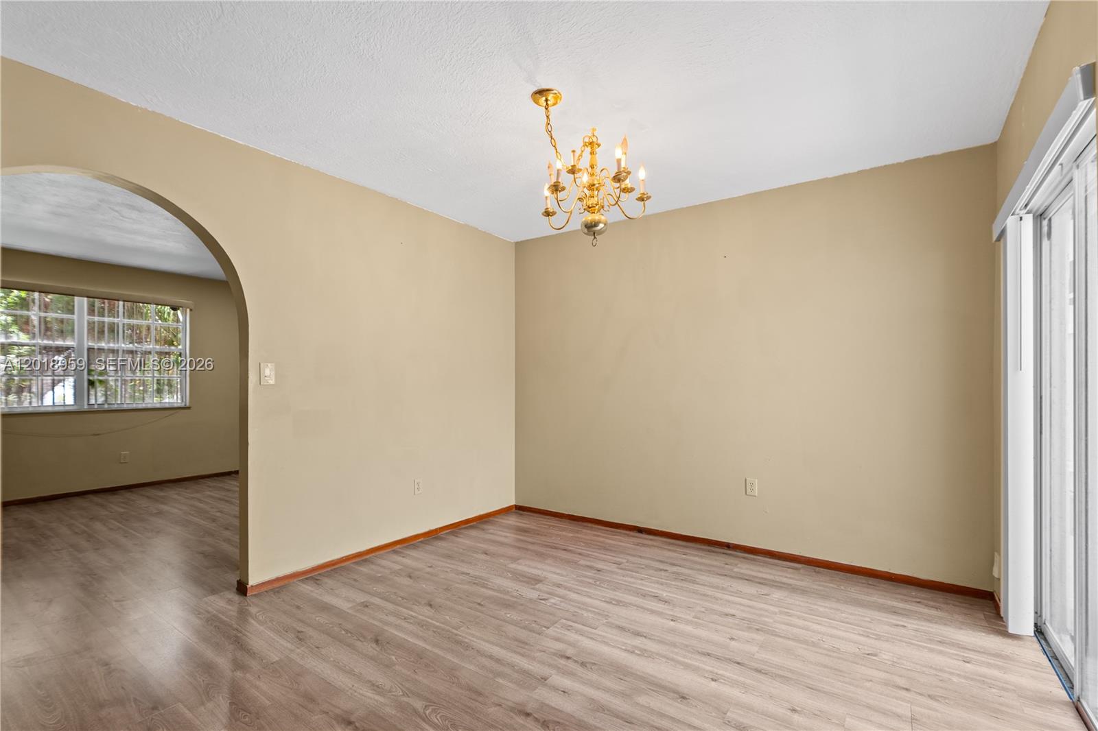 15345 Southwest 63rd Terrace Miami, FL 33193 - Photo 34 of 51 wooden floor in an empty room with a window