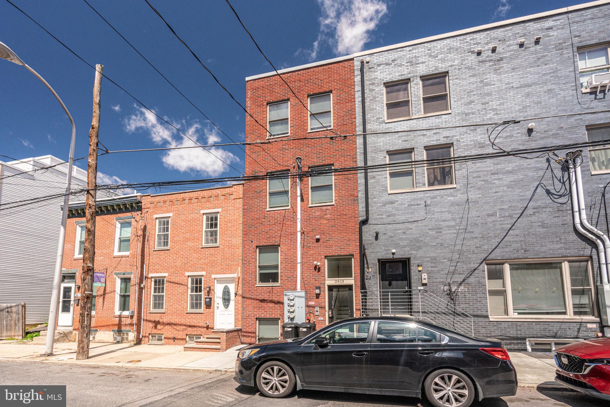 2613 Federal Street, Unit B Philadelphia, PA 19146 - Photo 19 of 21 a car parked in front of a building